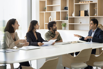 Group of multiracial students trainees of different age gender attend lecture seminar listen to...