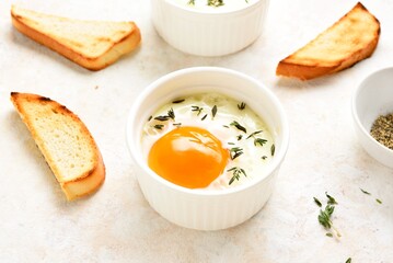 Eggs en cocotte (baked eggs)