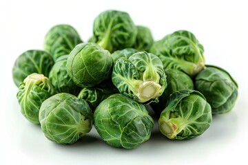 Fototapeta premium Isolated fresh brussels sprouts on a white background for culinary and nutritional purposes