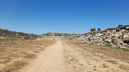 Walk on path in the stadium of the  Perge ancient city located in Aksu district of Antalya province in Turkey