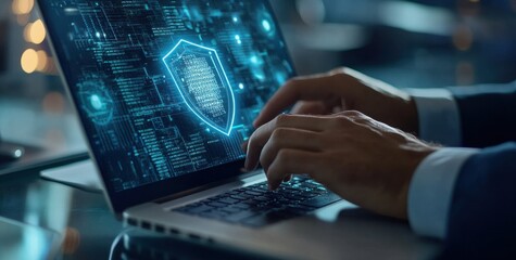 Businessman using laptop with digital security interface in modern office setting at night