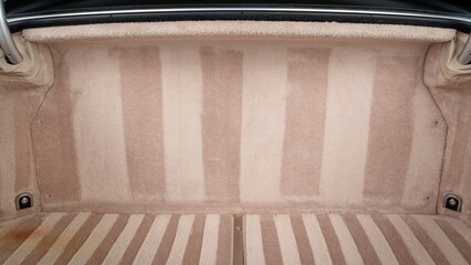 Tan carpet in a trunk