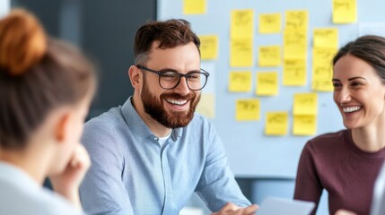 A group of colleagues actively engages in a brainstorming session, sharing ideas and insights in a vibrant office filled with colorful sticky notes, creating an energetic atmosphere