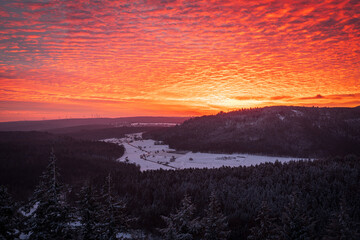 Breathtaking sunrise over the snow-covered German Black Forest