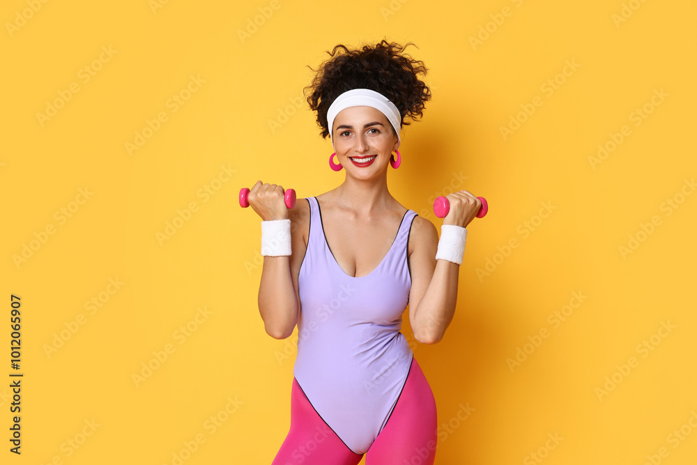 Poster Woman doing aerobic exercise with dumbbells on orange background