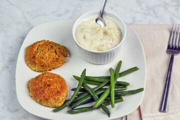 crab cakes  with  clam chowder and green beans