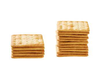 Stack of square water crackers isolated on white background. Water crackers placed on top of each other on a white background.