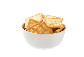 Square water crackers in a ceramic bowl isolated on white background.