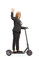 Middle aged woman riding an electric scooter and waving