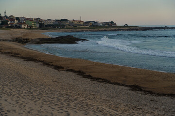 Praia de Moledo beach, Caminha. Viana do Castelo, Portugal. Sunset. Ínsua Fortress. Sunny day