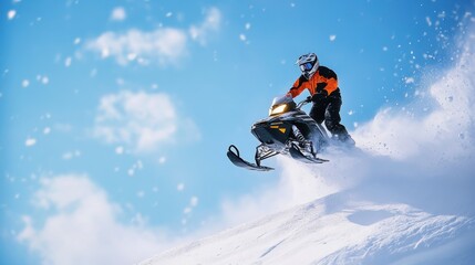 Snowmobiler launching off a snow-covered hill, captured mid-air against a bright winter sky, with snow swirling below  thrilling winter sports action.