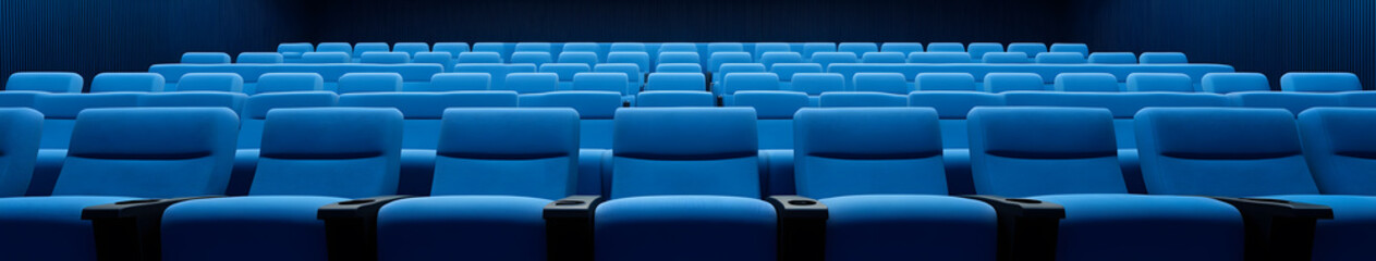 Fototapeta premium Blue Cinema Interior Design | Modern Theater with Stylish Seating and Elegant Lighting