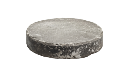 Simple round concrete object with a smooth surface on a white backdrop for design purposes