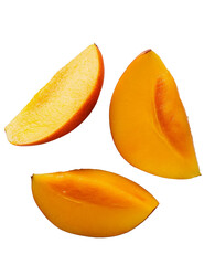 Fresh ripe mango with slices and green leaves displayed on a light background