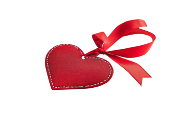 A close-up of a red leather heart tag with a satin ribbon on a white background