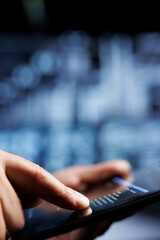 Close up of certified system administrator updating server rigs, writing intricate binary code...