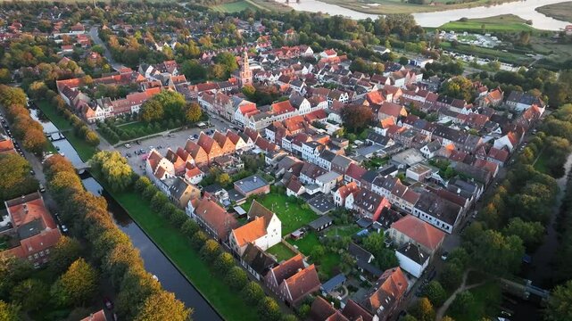 Marktplatz and Remonstrants Church in Friedrichstadt, charming Dutch-style town in Schleswig-Holstein with romantic canals along the Eider and Treene rivers and framed by gabled houses. Camera retreat