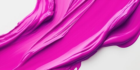 Obraz premium A vibrant splash of pink paint flowing on a white background, creating an artistic and colorful effect.