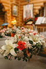 Floral Arrangements Adorn a Church Interior for a Holy Sacrament