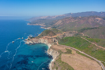 Beautiful landscape of Pacific Ocean coast along Highway 1 and Big Sur, aerial view, sunset, sunrise, fog. Concept, travel, vacation, weekend
