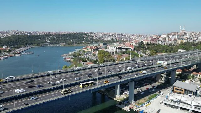 Istanbul Golden Horn view drone video shooting. Istanbul Silhouette and knee view, Istanbul Golden Horn known as the Golden Horn region. Bridge and bridge traffic passing over the sea. Golden Horn Bri