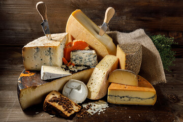 An eyecatching assortment of artisan cheeses that perfectly displays unique textures along with...