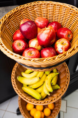 apples and bananas in different baskets