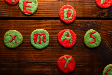 Festive homemade green and red Christmas letter cookies, Xmas Day
