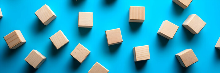 Wooden Cubes on Blue Background - Photo