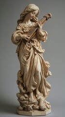 Obraz premium Angel Playing a Harp: A Classical Sculpture