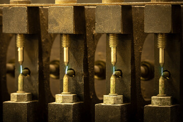 Sparks fly from the points of a magneto testing machine.  Designed to troubleshoot and inspect the...