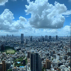 Photo: Tokyo Cityscape with Blue Sky and Clouds