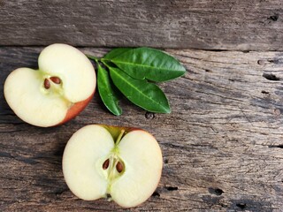 Ripe apple on wood background