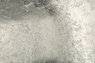 Shiny silver surface as background, closeup view