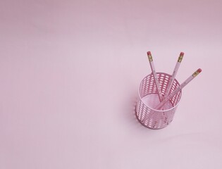 pink pencils in pink pencil cup against pink background. pencils read pink is my signature color.
