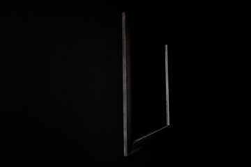 A frame is in a dark room