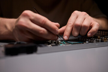 Hand Repairing a Graphics Card through the Application of Thermal Paste for Better Performance