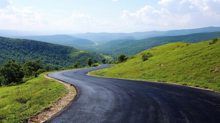 An asphalt road curving through green mountain terrain, under a clear sky with gentle, scattered clouds on a sunny day.