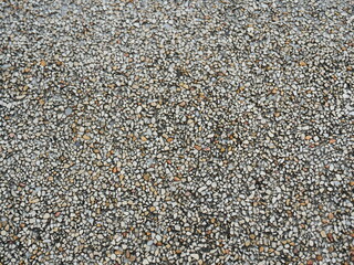Brown Gravel concrete texture of ball gravel spread on the ground background