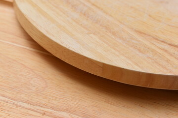 brown wooden sphere cuttingboard wood background