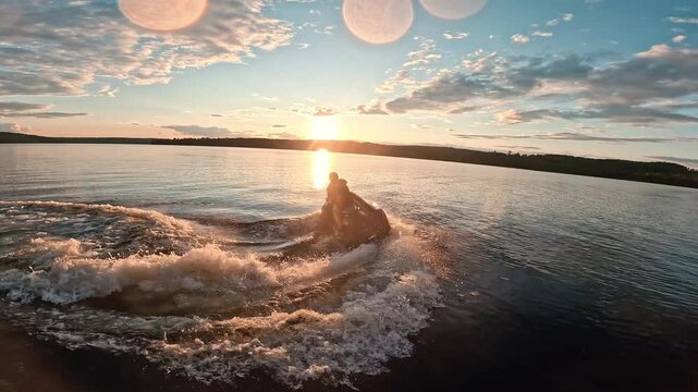 Slow motion female rider on a jet ski