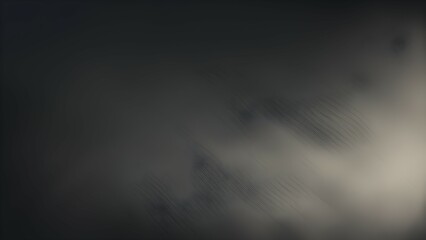 Fototapeta premium A blurred, dark background with subtle textures and gradients.
