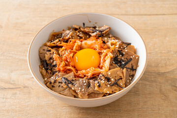 pork bulgogi rice bowl with kimchi and Korean pickled egg