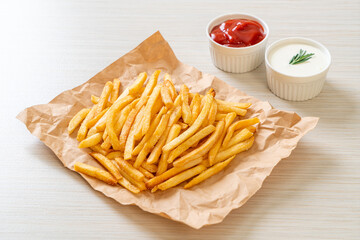 French fries with sour cream and ketchup