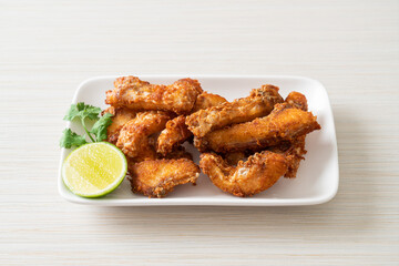 Fried Snapper Belly on white plate