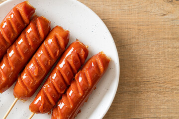 fried sausage skewer on plate