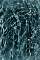 Title	
Blue water with ripples on the surface. Defocus blurred transparent blue colored clear calm water surface texture with splashes and bubbles. Water waves with shining pattern texture background.