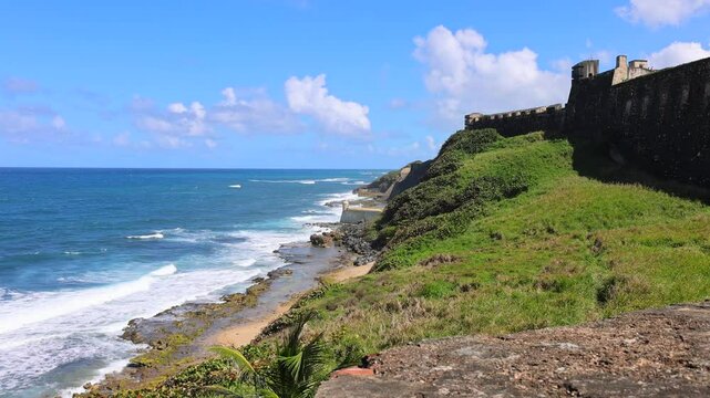 Castillo San Cristobal Fortress in old San Juan, Puerto Rico and ocean shore.