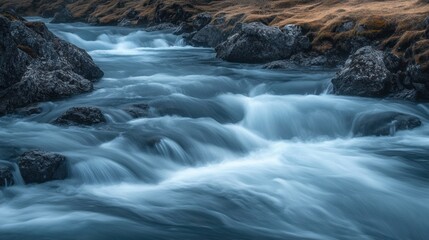 Obraz premium Fast Flowing River with Rocks