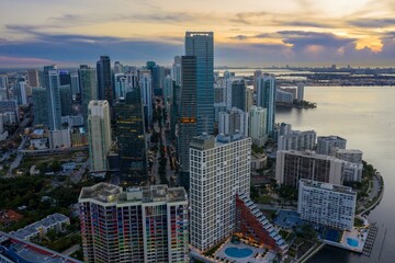 Obraz premium Downtown waterfront with buildings and condos at sunrise. Miami, Florida, United States.